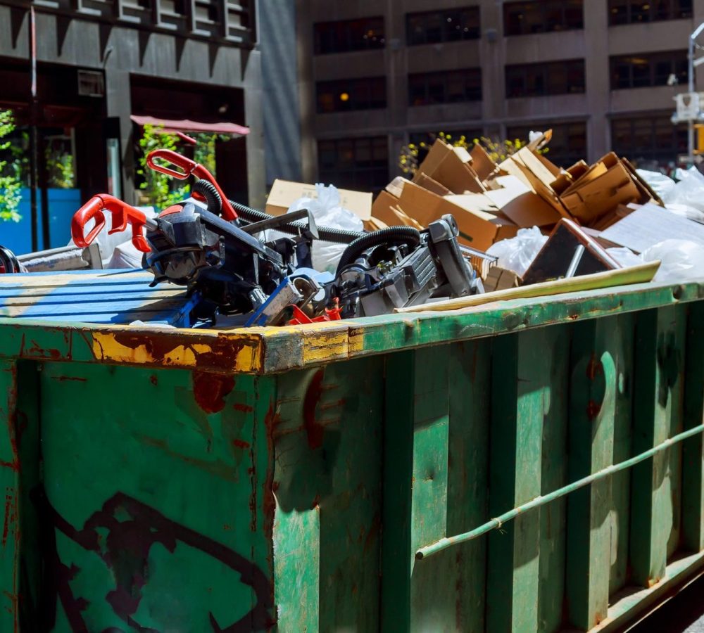 new-york-city-manhattan-container-over-flowing-dumpsters-being-full-with-garbage-e1653104278757.jpg